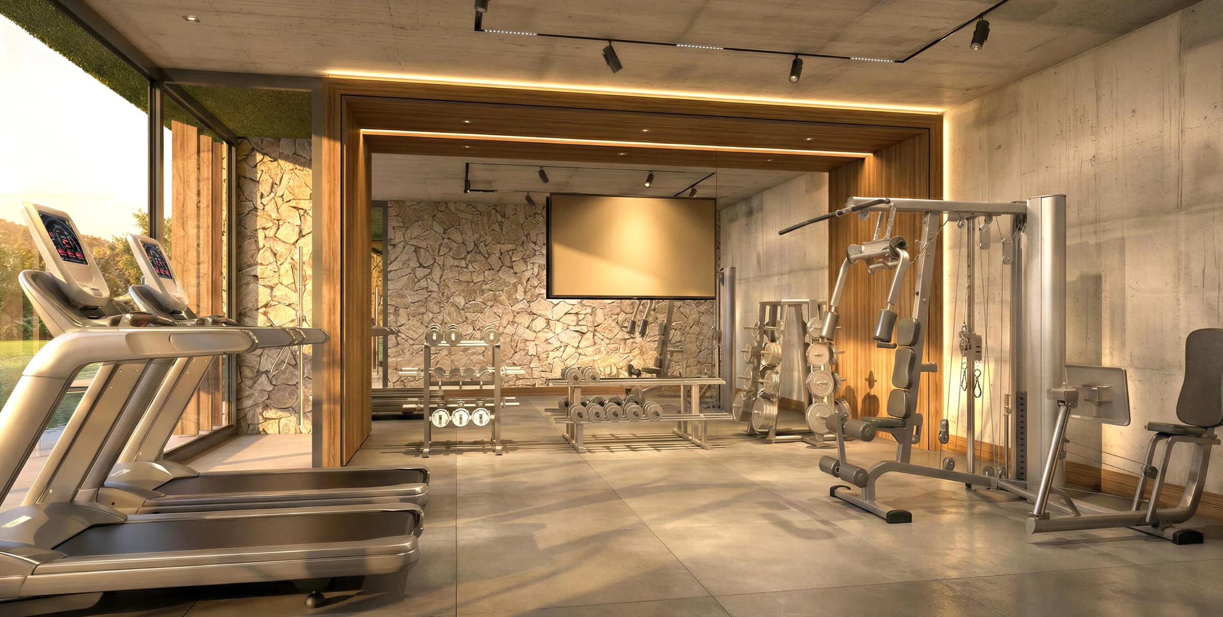 Perspectiva do espaço fitness com vista para o verde